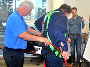 Working at Heights training participant works with a WHSC instructor
