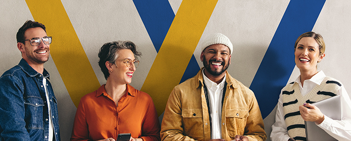 Professionals smiling together, representing teamwork at WHSC